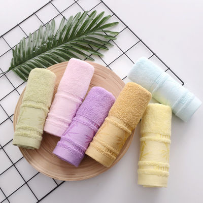Heißes Jacquard Bambusfaserhandtuch 25*50cm für weiche und absorbierende Haushaltsreinigung
