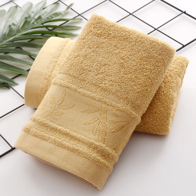 Heißes Jacquard Bambusfaserhandtuch 25*50cm für weiche und absorbierende Haushaltsreinigung