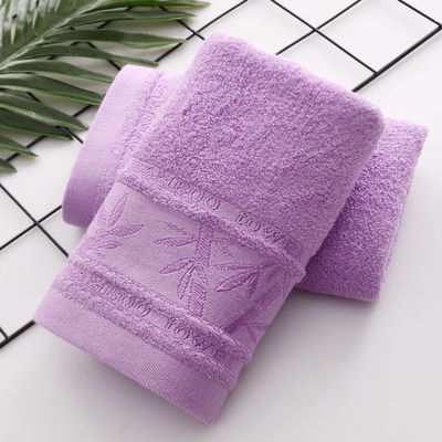 Heißes Jacquard Bambusfaserhandtuch 25*50cm für weiche und absorbierende Haushaltsreinigung