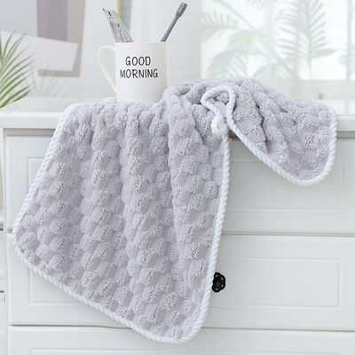 Nachhaltige Gesichtshandtücher aus Korallenfleece mit starker Absorptionsfähigkeit und gewebtem Design