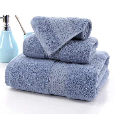 Absorbierendes Haushaltshandtuch aus reiner Baumwolle Drei-Stücke-Set mit beige Raster und feste Farbe
