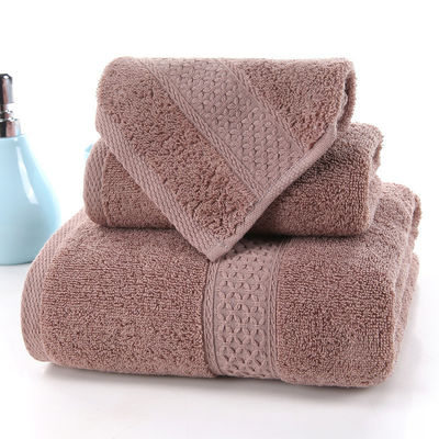 Absorbierendes Haushaltshandtuch aus reiner Baumwolle Drei-Stücke-Set mit beige Raster und feste Farbe