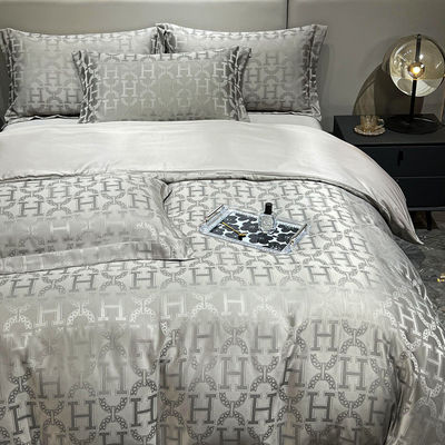 40 Stoffzahlen Leicht Luxus Satin Jacquard Vierstück-Bettwäsche Set für Landmärkte