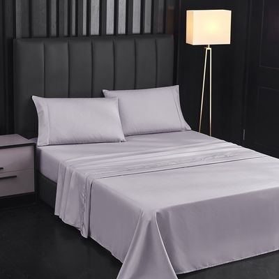 Schmücken Sie Ihr Bett mit gestickten Bettwäsche-Sets und passenden Vorhängen