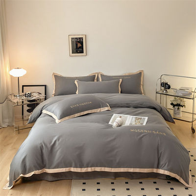 2023 Style Grade A 100% Baumwolle 4 Stück Bettwäsche Set mit gestickten Ecke Matching Prozess