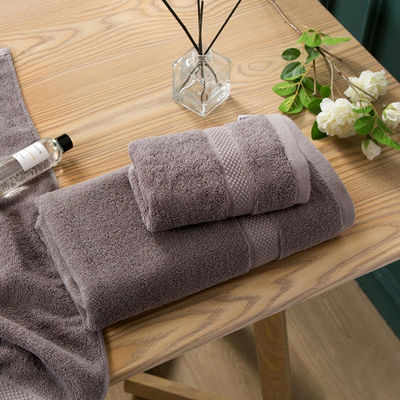 5-Sterne-Hotel 100% Baumwoll-Spa-Gesicht-Hand-Badehandtuch-Sets mit benutzerdefiniertem Logo und solider Farbe